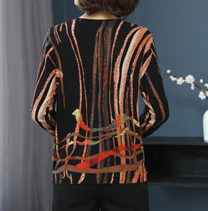 Fire on black sweater