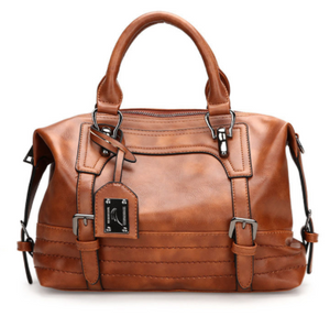 Brown leather small messenger bag + clasp cuff