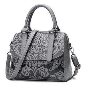 Satchel with embossed floral design