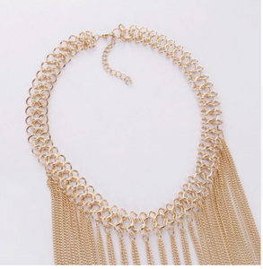 Multi layered gold colored tassel necklace