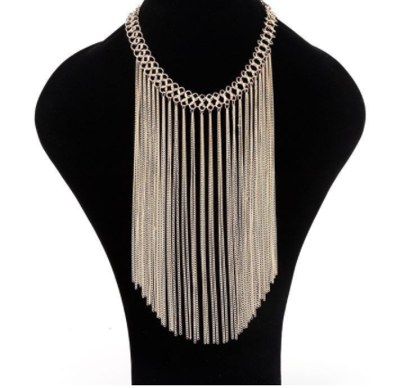 Multi layered gold colored tassel necklace