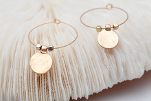 Coined hoops