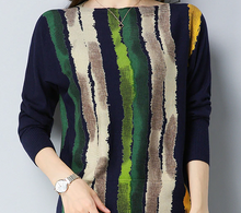 Stripes on solid sweater
