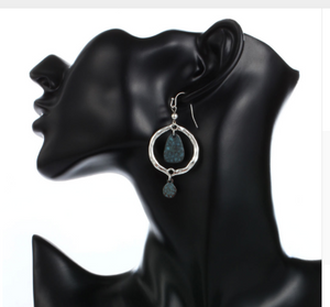 Blue in hoop earrings