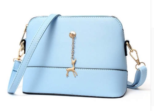 Shell high quality leather bag in solid colors.