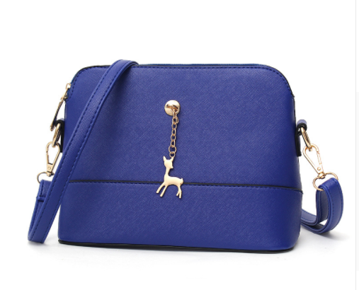 Shell high quality leather bag in solid colors.